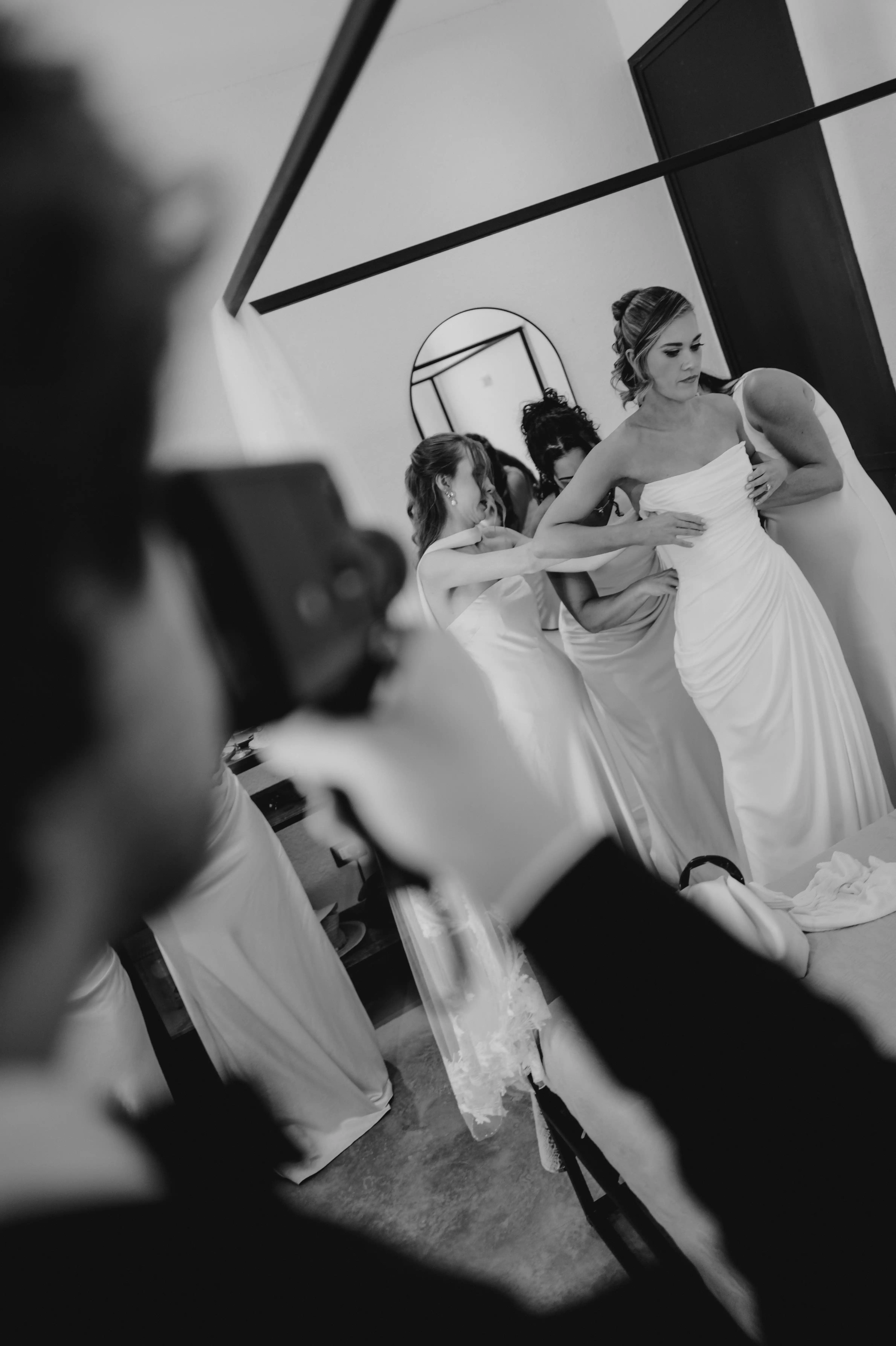 Black and white bridal preparation photographed in an editorial wedding photography style